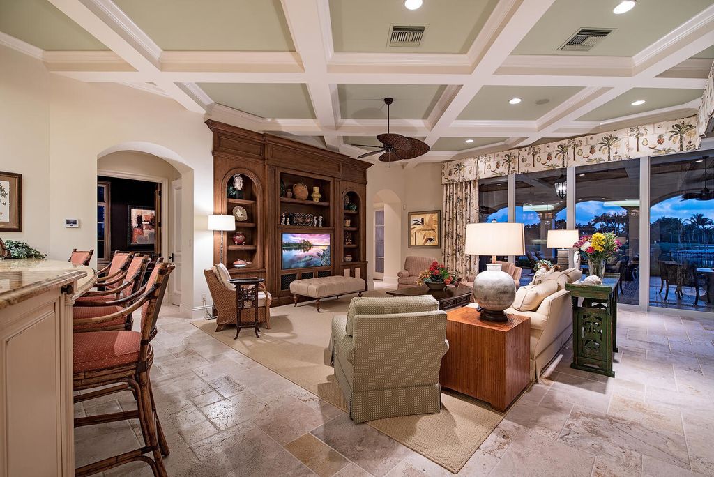 The Home in Naples is a luxurious custom built residence on one of the most sought after streets in Grey Oaks now available for sale. This home located at 2148 Canna Way, Naples, Florida