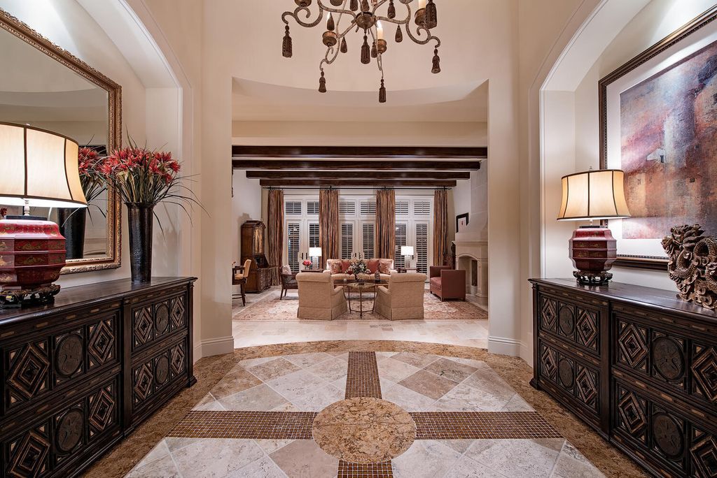The Home in Naples is a luxurious custom built residence on one of the most sought after streets in Grey Oaks now available for sale. This home located at 2148 Canna Way, Naples, Florida