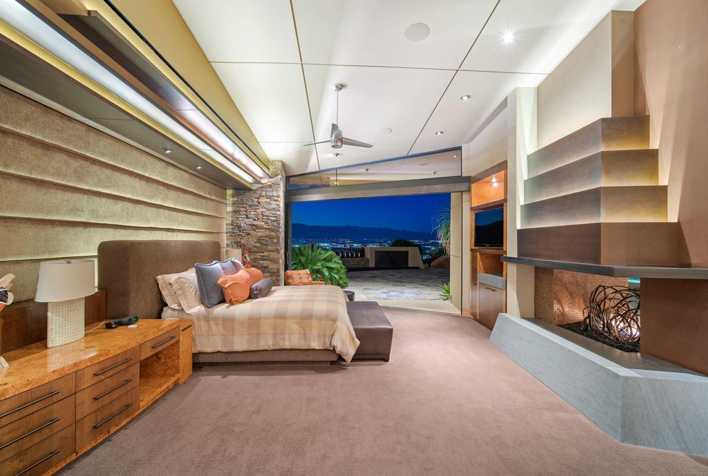 The Home in Rancho Mirage is a hillside estate with views of the Coachella Valley desert - One of the finest homes Mirada Estates now available for sale. This home located at 55 Granite Ridge Rd, Rancho Mirage, California