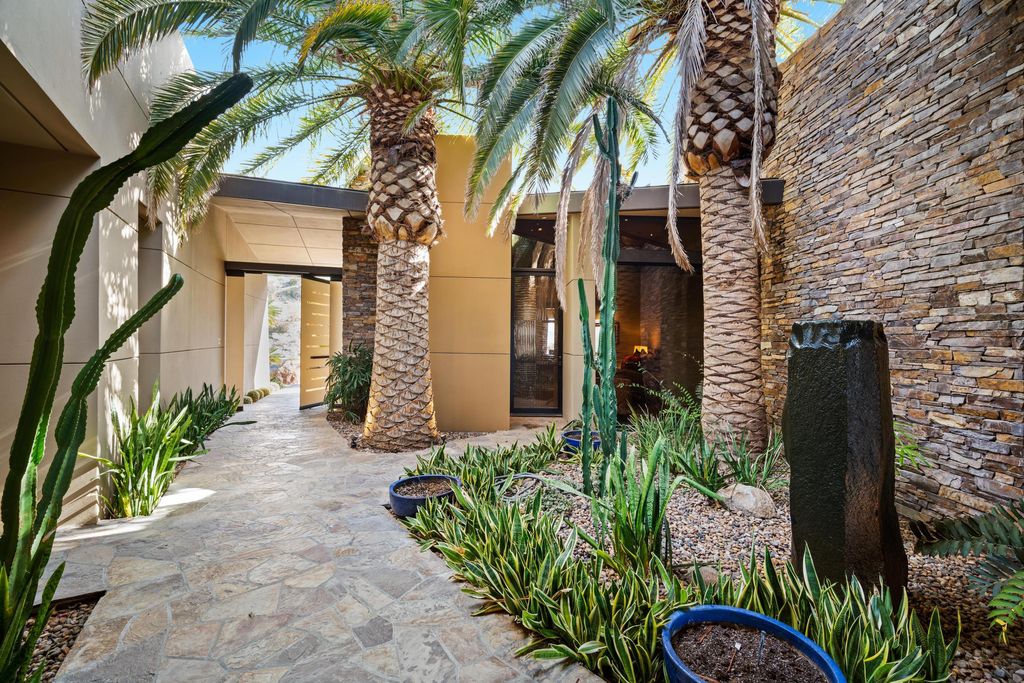 The Home in Rancho Mirage is a hillside estate with views of the Coachella Valley desert - One of the finest homes Mirada Estates now available for sale. This home located at 55 Granite Ridge Rd, Rancho Mirage, California