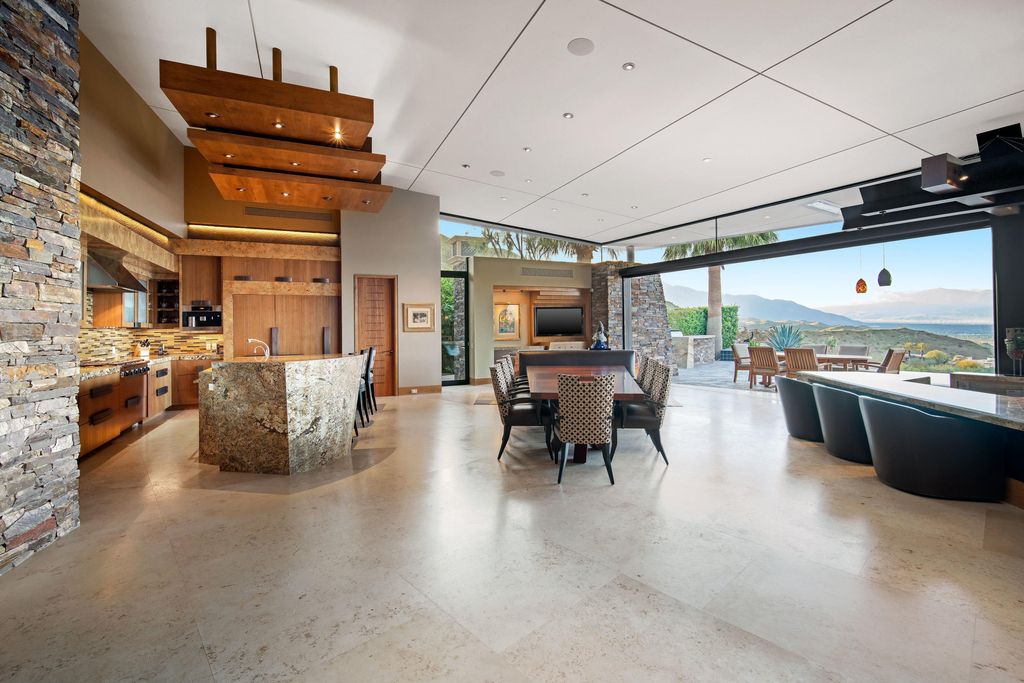 The Home in Rancho Mirage is a hillside estate with views of the Coachella Valley desert - One of the finest homes Mirada Estates now available for sale. This home located at 55 Granite Ridge Rd, Rancho Mirage, California