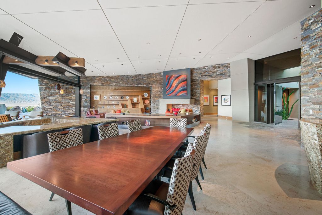 The Home in Rancho Mirage is a hillside estate with views of the Coachella Valley desert - One of the finest homes Mirada Estates now available for sale. This home located at 55 Granite Ridge Rd, Rancho Mirage, California