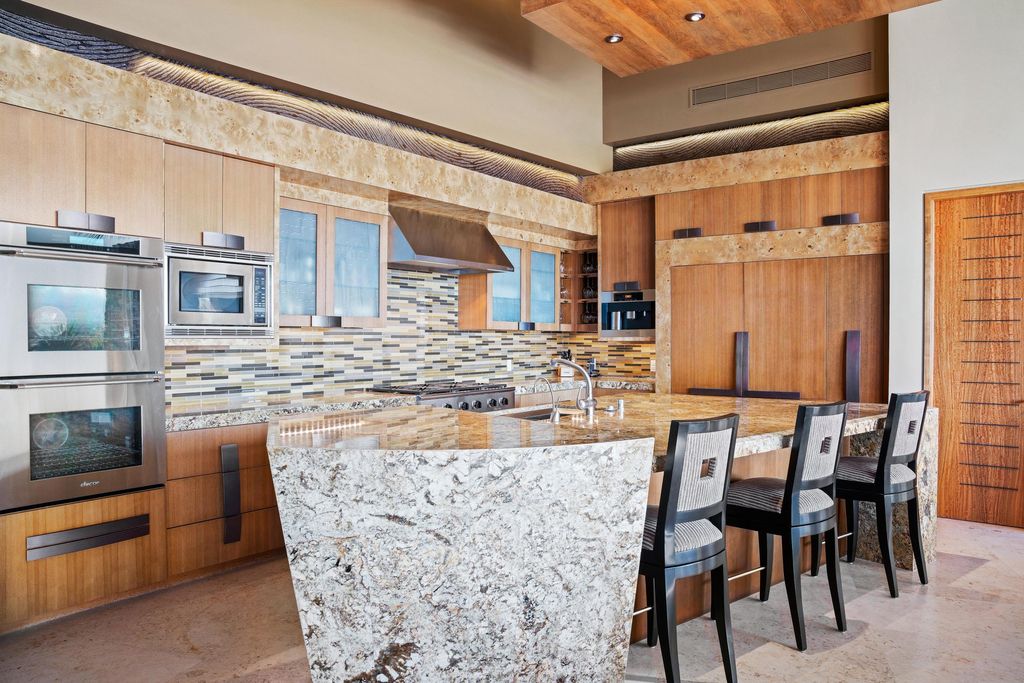 The Home in Rancho Mirage is a hillside estate with views of the Coachella Valley desert - One of the finest homes Mirada Estates now available for sale. This home located at 55 Granite Ridge Rd, Rancho Mirage, California