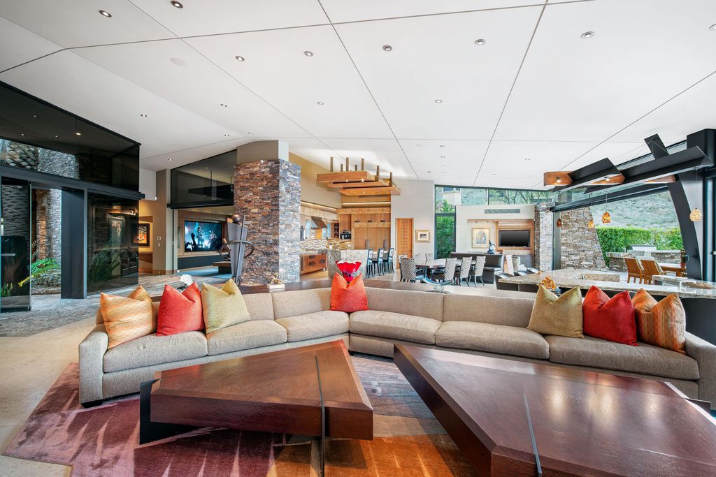 The Home in Rancho Mirage is a hillside estate with views of the Coachella Valley desert - One of the finest homes Mirada Estates now available for sale. This home located at 55 Granite Ridge Rd, Rancho Mirage, California