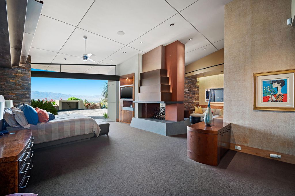 The Home in Rancho Mirage is a hillside estate with views of the Coachella Valley desert - One of the finest homes Mirada Estates now available for sale. This home located at 55 Granite Ridge Rd, Rancho Mirage, California