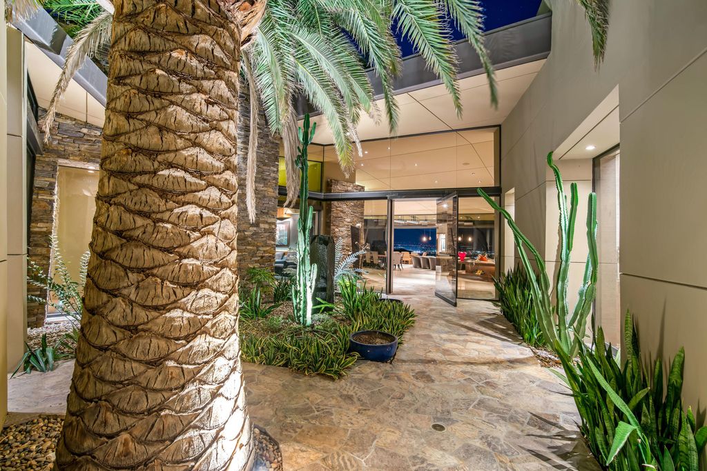 The Home in Rancho Mirage is a hillside estate with views of the Coachella Valley desert - One of the finest homes Mirada Estates now available for sale. This home located at 55 Granite Ridge Rd, Rancho Mirage, California
