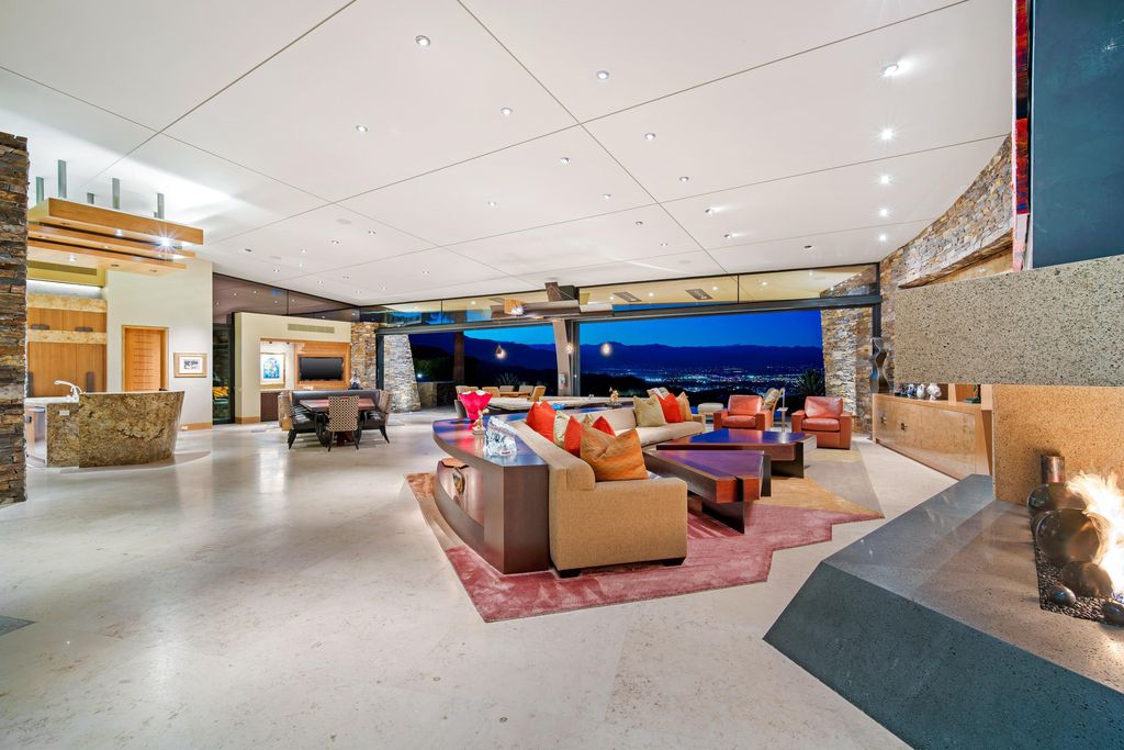 The Home in Rancho Mirage is a hillside estate with views of the Coachella Valley desert - One of the finest homes Mirada Estates now available for sale. This home located at 55 Granite Ridge Rd, Rancho Mirage, California