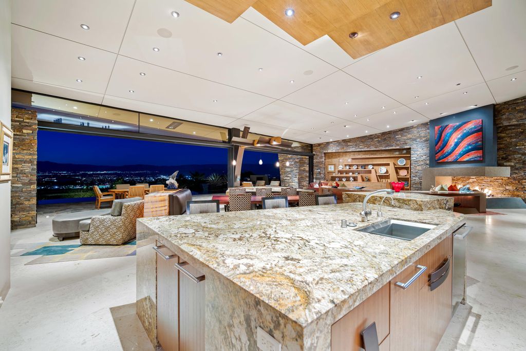 The Home in Rancho Mirage is a hillside estate with views of the Coachella Valley desert - One of the finest homes Mirada Estates now available for sale. This home located at 55 Granite Ridge Rd, Rancho Mirage, California