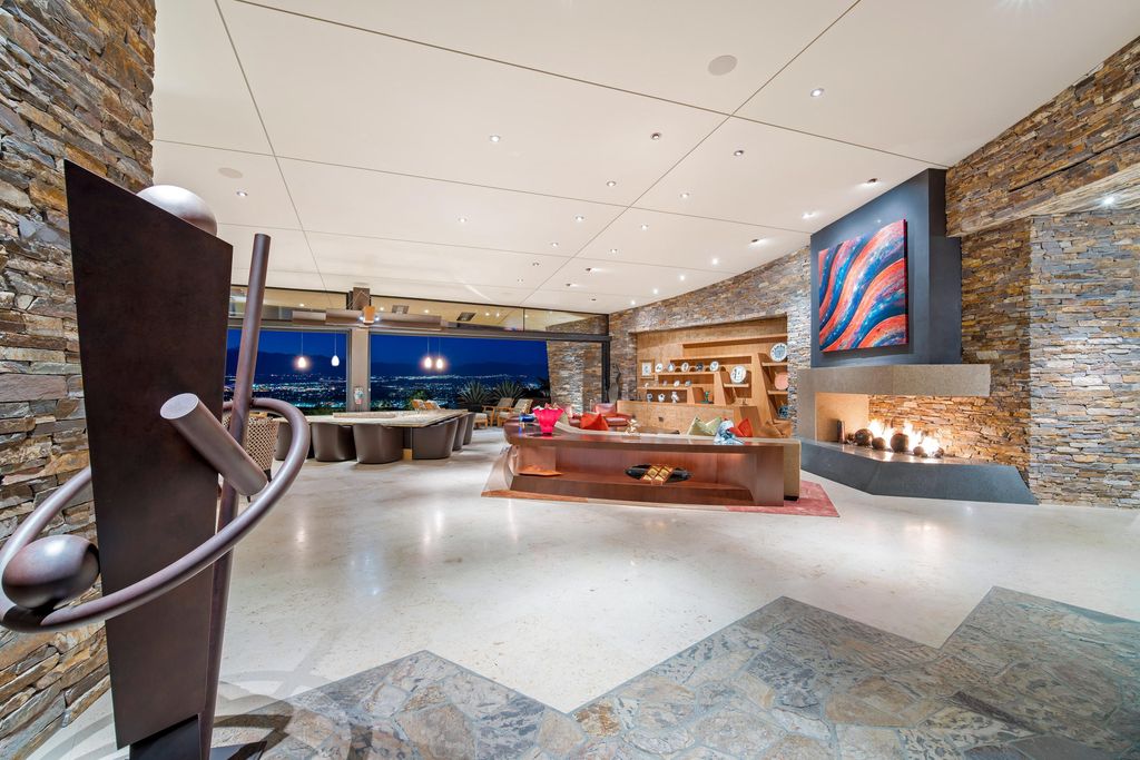 The Home in Rancho Mirage is a hillside estate with views of the Coachella Valley desert - One of the finest homes Mirada Estates now available for sale. This home located at 55 Granite Ridge Rd, Rancho Mirage, California