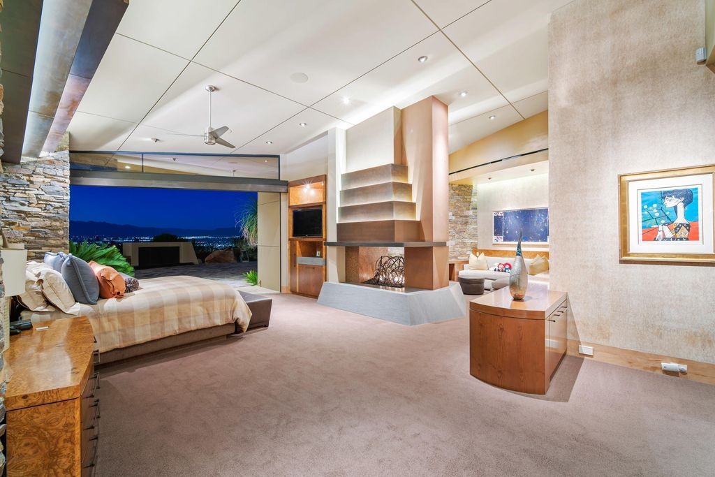 The Home in Rancho Mirage is a hillside estate with views of the Coachella Valley desert - One of the finest homes Mirada Estates now available for sale. This home located at 55 Granite Ridge Rd, Rancho Mirage, California