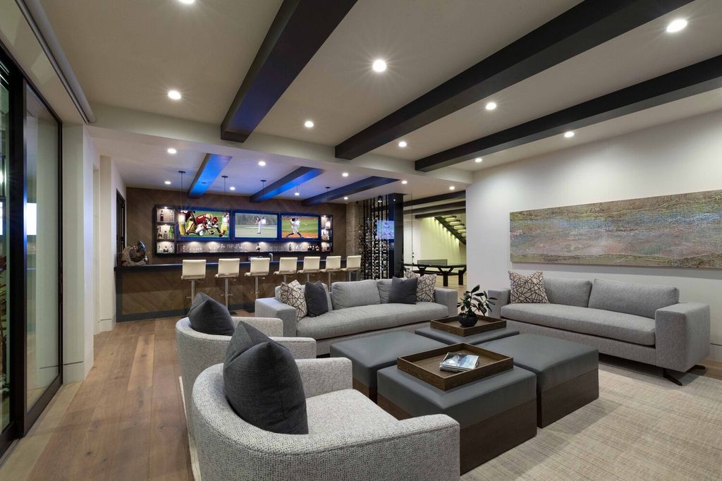 The Home in Corona Del Mar is a contemporary ocean view residence features sweeping ocean and Catalina views now available for sale. This home located at 409 De Sola Ter, Corona Del Mar, California