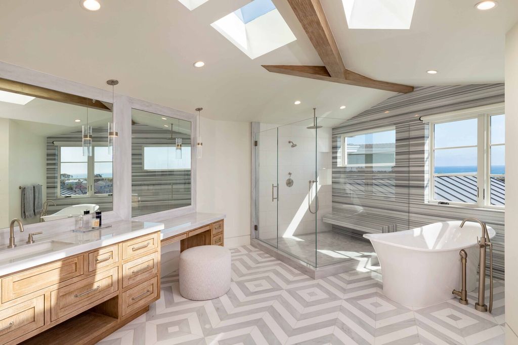 The Home in Corona Del Mar is a contemporary ocean view residence features sweeping ocean and Catalina views now available for sale. This home located at 409 De Sola Ter, Corona Del Mar, California