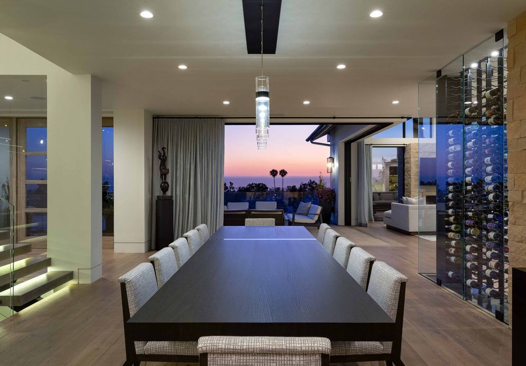 The Home in Corona Del Mar is a contemporary ocean view residence features sweeping ocean and Catalina views now available for sale. This home located at 409 De Sola Ter, Corona Del Mar, California