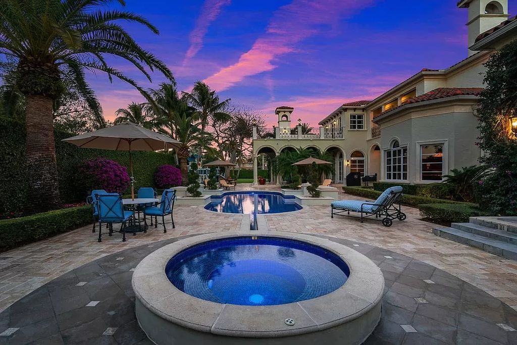 The Boca Raton Home is a luxurious five-bedroom estate complemented by the refreshed decor, seamlessly blending clean lines and traditional elegance now available for sale. This home located at 1869 Sabal Palm Dr, Boca Raton, Florida