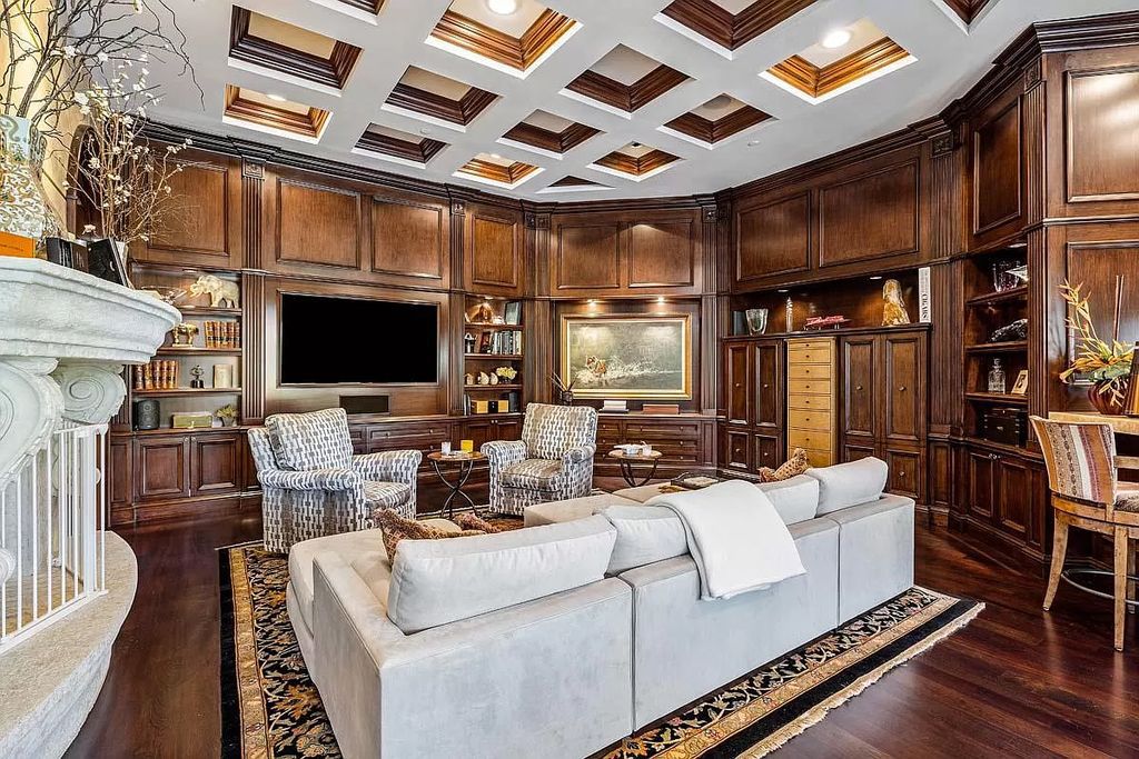 The Boca Raton Home is a luxurious five-bedroom estate complemented by the refreshed decor, seamlessly blending clean lines and traditional elegance now available for sale. This home located at 1869 Sabal Palm Dr, Boca Raton, Florida