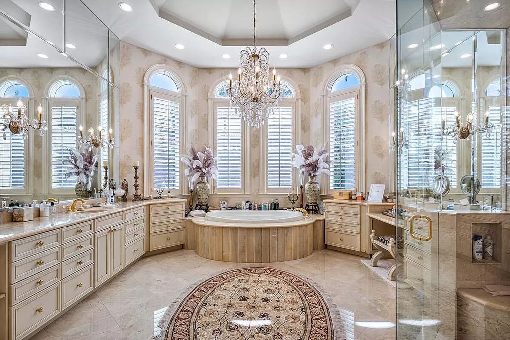 The Boca Raton Home is a luxurious five-bedroom estate complemented by the refreshed decor, seamlessly blending clean lines and traditional elegance now available for sale. This home located at 1869 Sabal Palm Dr, Boca Raton, Florida