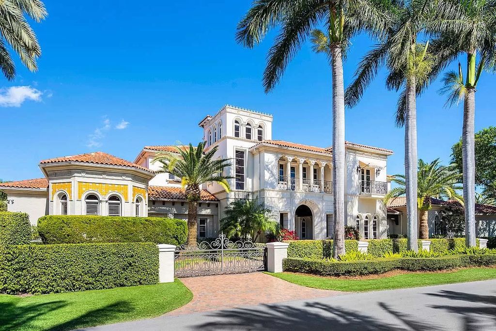 The Boca Raton Home is a luxurious five-bedroom estate complemented by the refreshed decor, seamlessly blending clean lines and traditional elegance now available for sale. This home located at 1869 Sabal Palm Dr, Boca Raton, Florida