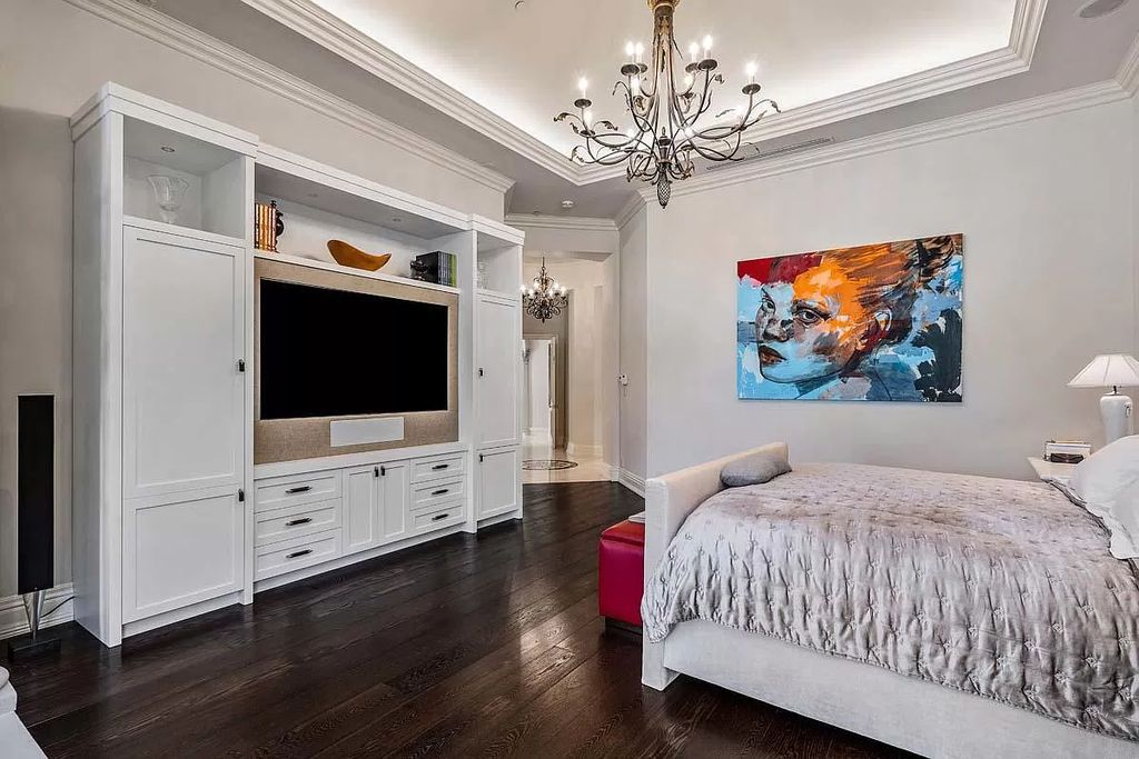 The Boca Raton Home is a luxurious five-bedroom estate complemented by the refreshed decor, seamlessly blending clean lines and traditional elegance now available for sale. This home located at 1869 Sabal Palm Dr, Boca Raton, Florida