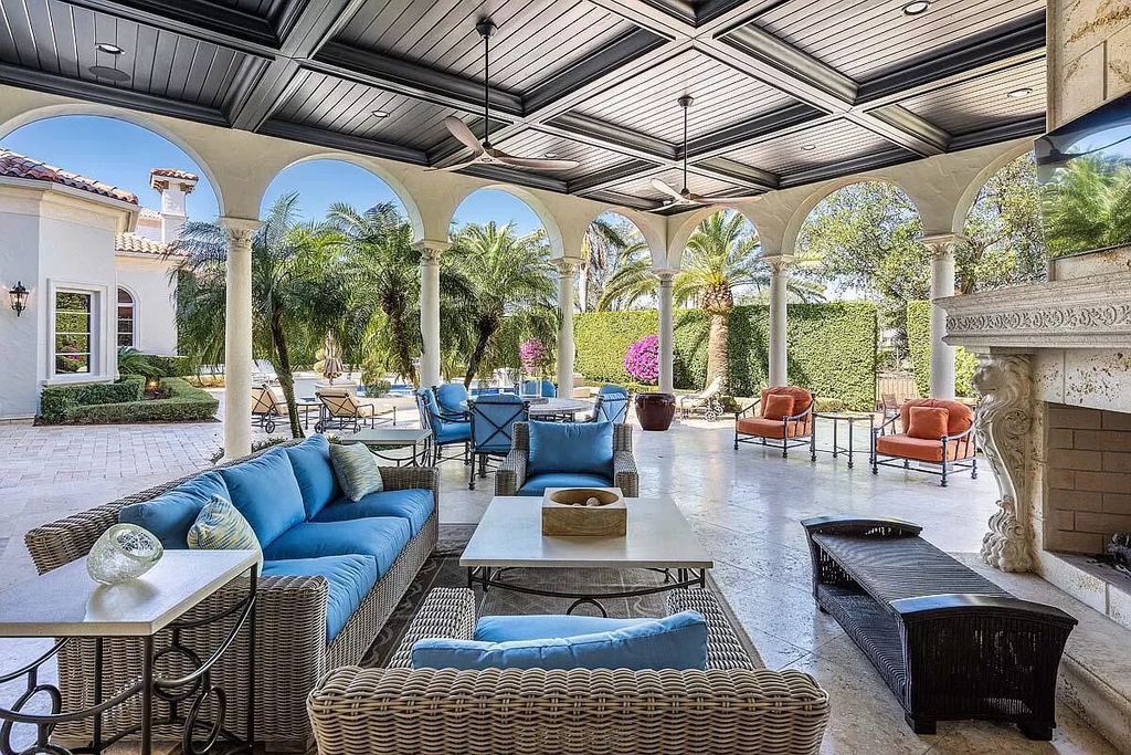 The Boca Raton Home is a luxurious five-bedroom estate complemented by the refreshed decor, seamlessly blending clean lines and traditional elegance now available for sale. This home located at 1869 Sabal Palm Dr, Boca Raton, Florida