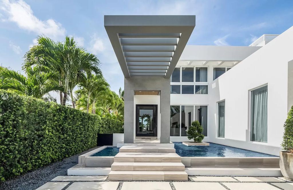 The Home in Miami Beach is a custom built masterpiece offers 6,000 sf of meticulously crafted living space along with gorgeous finishes now available for sale. This home located at 672 S Shore Dr, Miami Beach, Florida