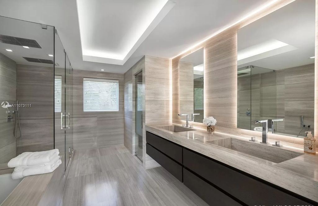 The Home in Miami Beach is a custom built masterpiece offers 6,000 sf of meticulously crafted living space along with gorgeous finishes now available for sale. This home located at 672 S Shore Dr, Miami Beach, Florida