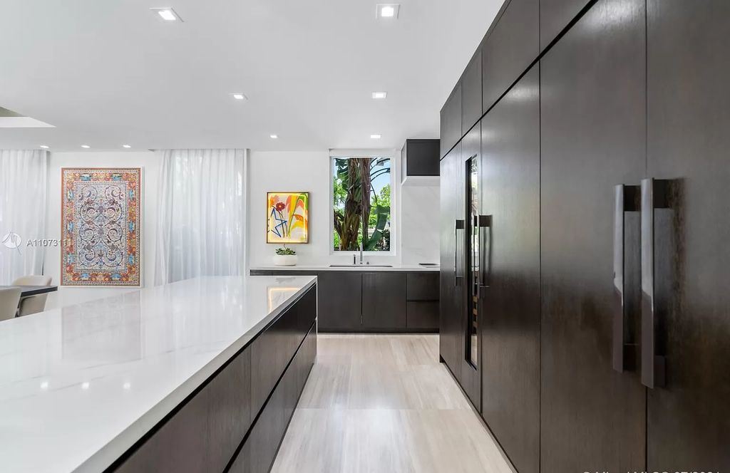 The Home in Miami Beach is a custom built masterpiece offers 6,000 sf of meticulously crafted living space along with gorgeous finishes now available for sale. This home located at 672 S Shore Dr, Miami Beach, Florida