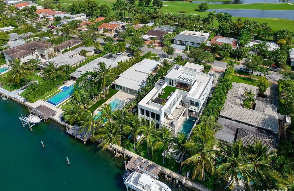 The Home in Miami Beach is a custom built masterpiece offers 6,000 sf of meticulously crafted living space along with gorgeous finishes now available for sale. This home located at 672 S Shore Dr, Miami Beach, Florida
