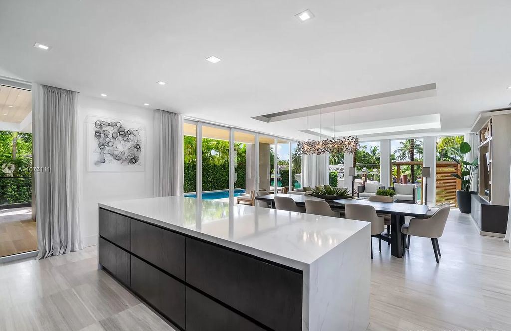 The Home in Miami Beach is a custom built masterpiece offers 6,000 sf of meticulously crafted living space along with gorgeous finishes now available for sale. This home located at 672 S Shore Dr, Miami Beach, Florida