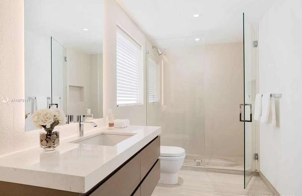 The Home in Miami Beach is a custom built masterpiece offers 6,000 sf of meticulously crafted living space along with gorgeous finishes now available for sale. This home located at 672 S Shore Dr, Miami Beach, Florida