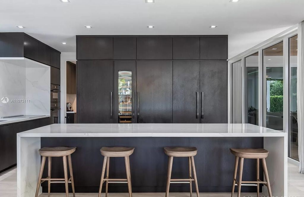 The Home in Miami Beach is a custom built masterpiece offers 6,000 sf of meticulously crafted living space along with gorgeous finishes now available for sale. This home located at 672 S Shore Dr, Miami Beach, Florida
