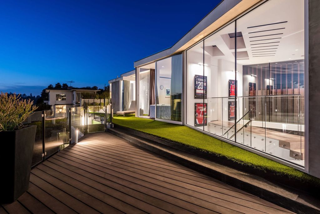 The Home in Los Angeles is a distinguished architectural masterpiece sited in prime Bel Air boasts panoramic city, ocean, and mountain views now available for sale. This home located at 1979 Stradella Rd, Los Angeles, California