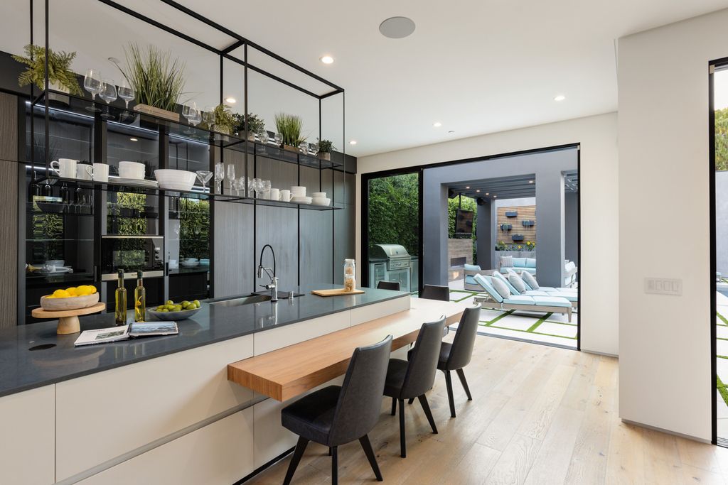 The Home in Venice is an architectural oasis situated in a premiere location with luxurious amenities and technology now available for sale. This home located at 1371 Palms Blvd, Venice, California