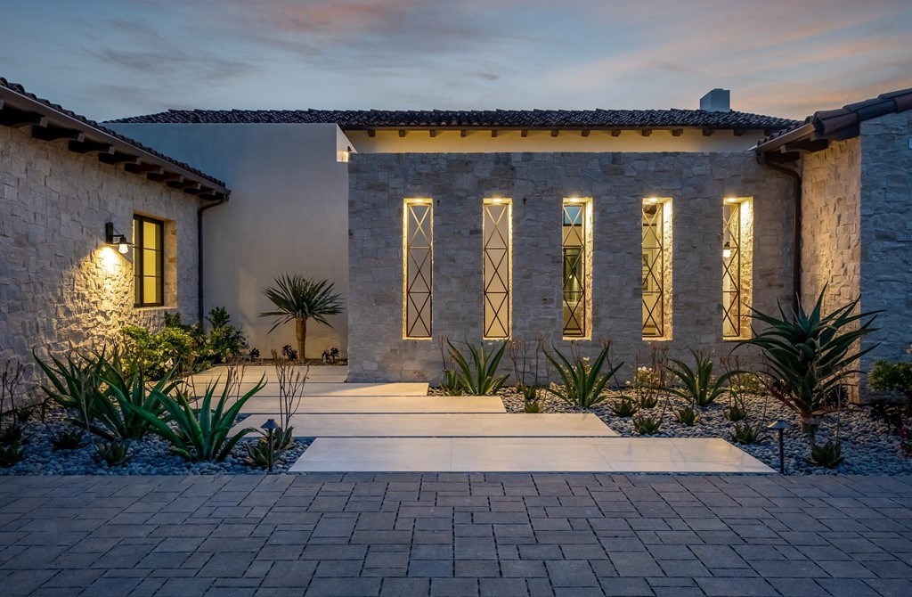 The Home in Rancho Santa Fe is a brand new estate with An impressive open-living great room boasts a soaring ceiling now available for sale. This home located at 16836 El Zorro Vis, Rancho Santa Fe, California