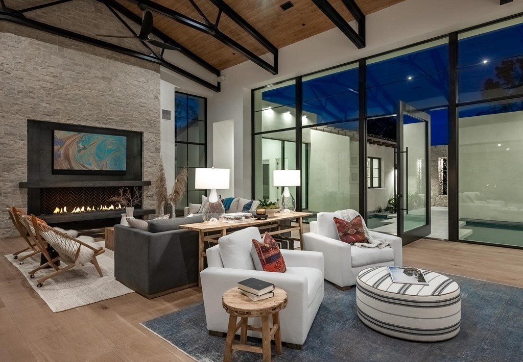 The Home in Rancho Santa Fe is a brand new estate with An impressive open-living great room boasts a soaring ceiling now available for sale. This home located at 16836 El Zorro Vis, Rancho Santa Fe, California