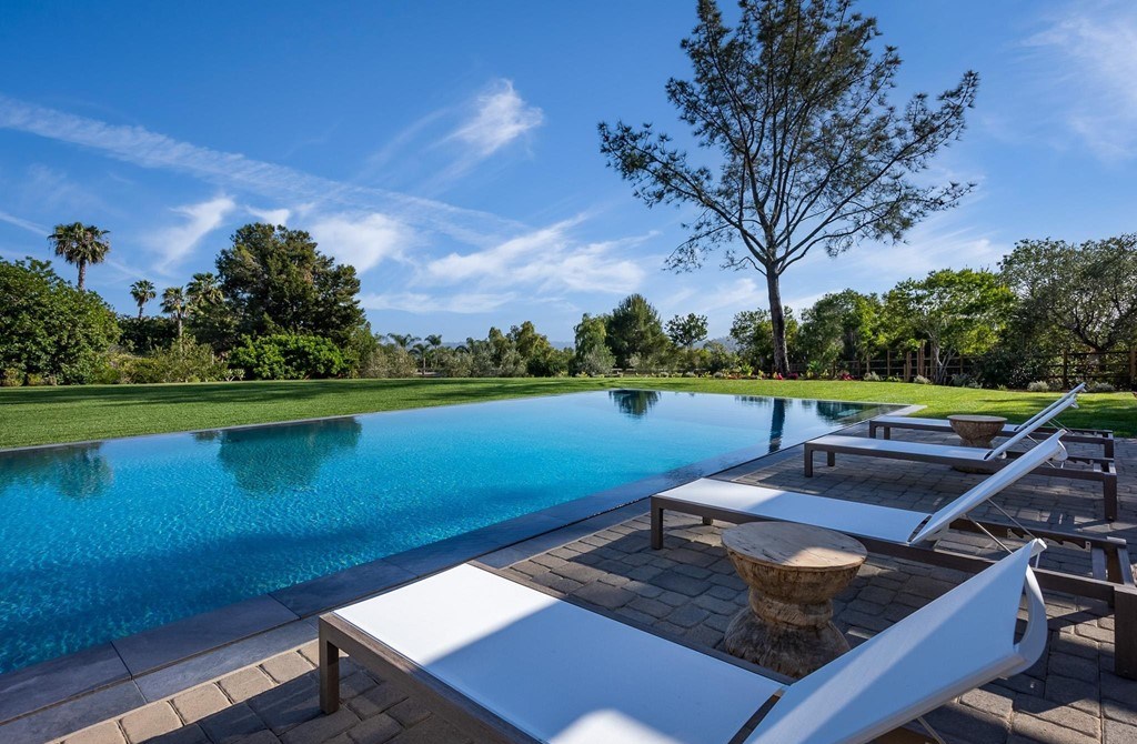 The Home in Rancho Santa Fe is a brand new estate with An impressive open-living great room boasts a soaring ceiling now available for sale. This home located at 16836 El Zorro Vis, Rancho Santa Fe, California