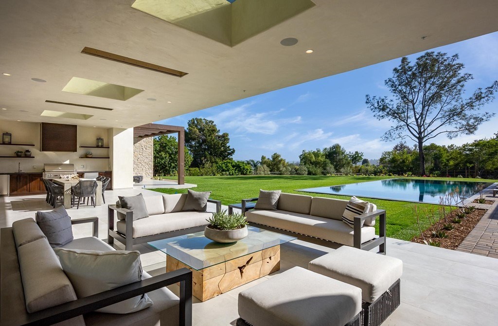The Home in Rancho Santa Fe is a brand new estate with An impressive open-living great room boasts a soaring ceiling now available for sale. This home located at 16836 El Zorro Vis, Rancho Santa Fe, California