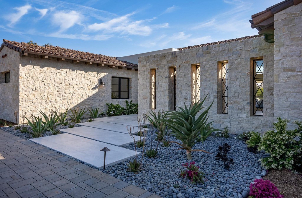 The Home in Rancho Santa Fe is a brand new estate with An impressive open-living great room boasts a soaring ceiling now available for sale. This home located at 16836 El Zorro Vis, Rancho Santa Fe, California