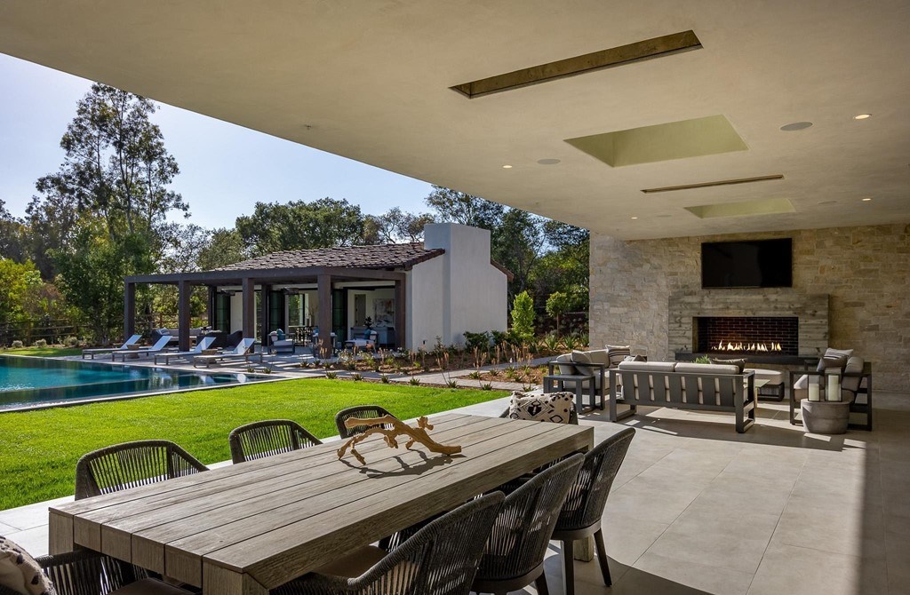 The Home in Rancho Santa Fe is a brand new estate with An impressive open-living great room boasts a soaring ceiling now available for sale. This home located at 16836 El Zorro Vis, Rancho Santa Fe, California