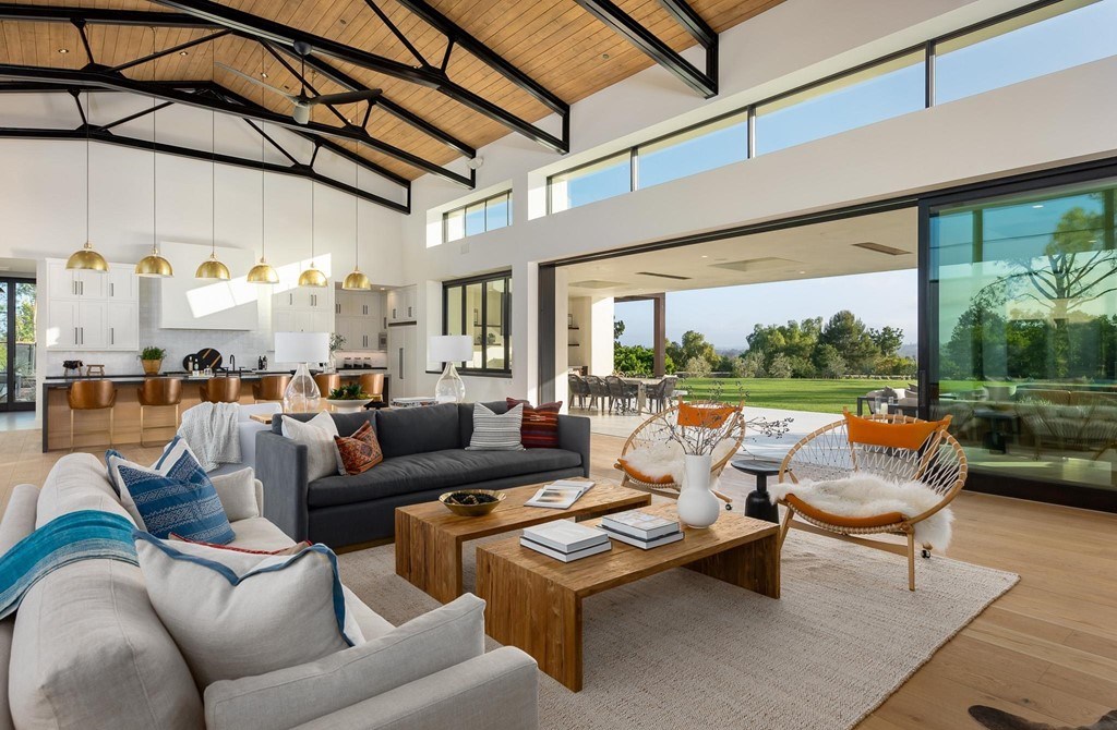 The Home in Rancho Santa Fe is a brand new estate with An impressive open-living great room boasts a soaring ceiling now available for sale. This home located at 16836 El Zorro Vis, Rancho Santa Fe, California