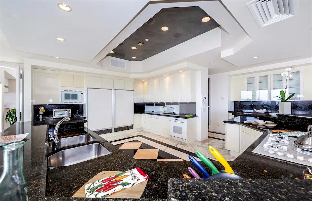 Immerse in tropical landscape and Hawaii island ambiance in a hillside $10,000,000 estate 