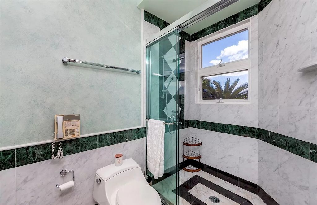 Immerse in tropical landscape and Hawaii island ambiance in a hillside $10,000,000 estate 