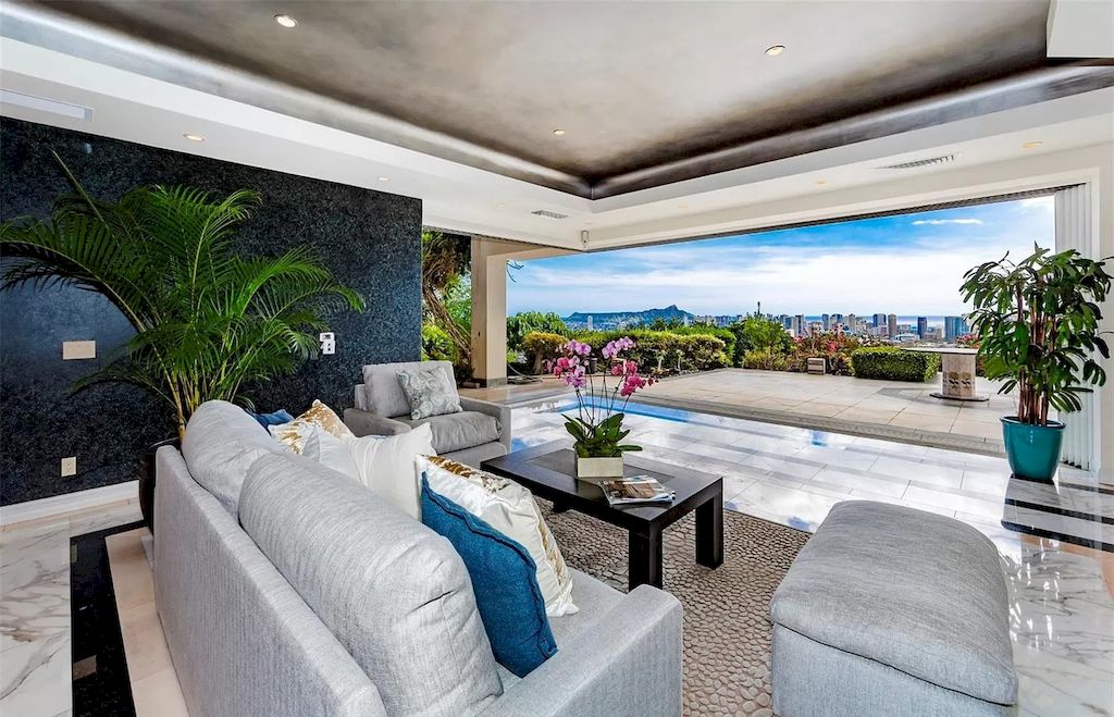 Immerse in tropical landscape and Hawaii island ambiance in a hillside $10,000,000 estate 
