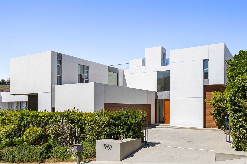 The Home in Los Angeles is a newly built modern architectural estate with the explosive city and canyon views now available for sale. This home located at 1967 Mount Olympus Dr, Los Angeles, California