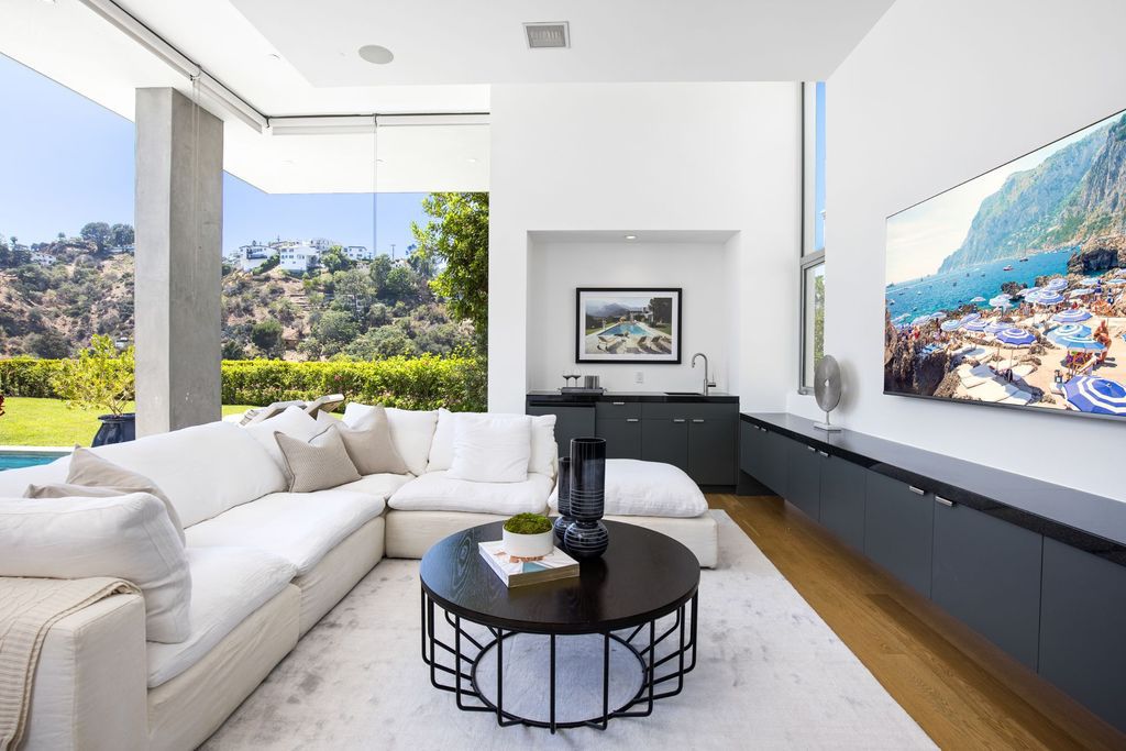 The Home in Los Angeles is a newly built modern architectural estate with the explosive city and canyon views now available for sale. This home located at 1967 Mount Olympus Dr, Los Angeles, California