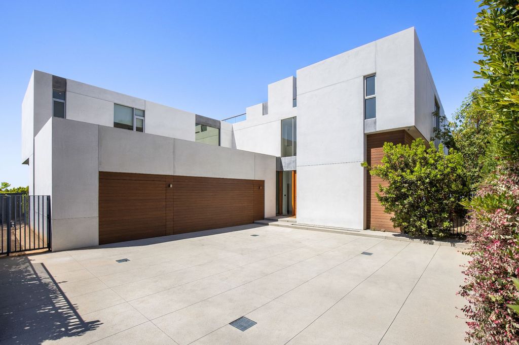 The Home in Los Angeles is a newly built modern architectural estate with the explosive city and canyon views now available for sale. This home located at 1967 Mount Olympus Dr, Los Angeles, California