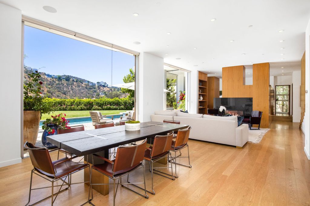 The Home in Los Angeles is a newly built modern architectural estate with the explosive city and canyon views now available for sale. This home located at 1967 Mount Olympus Dr, Los Angeles, California