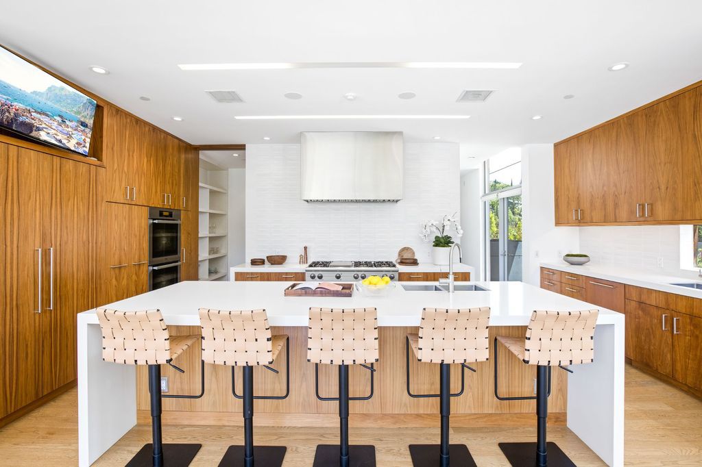 The Home in Los Angeles is a newly built modern architectural estate with the explosive city and canyon views now available for sale. This home located at 1967 Mount Olympus Dr, Los Angeles, California