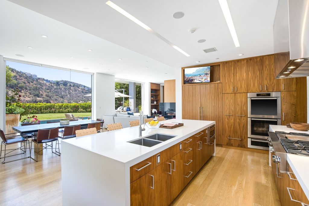 The Home in Los Angeles is a newly built modern architectural estate with the explosive city and canyon views now available for sale. This home located at 1967 Mount Olympus Dr, Los Angeles, California