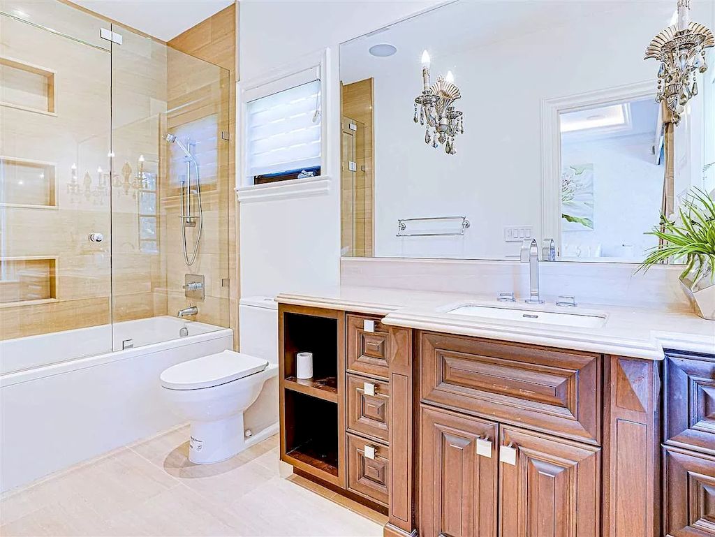 The Beautiful Cherry Blossoms House in Vancouver is a meticulously custom-built home now available for sale. This home is located at 1626 Avondale Ave, Vancouver, BC V6M 1S1, Canada