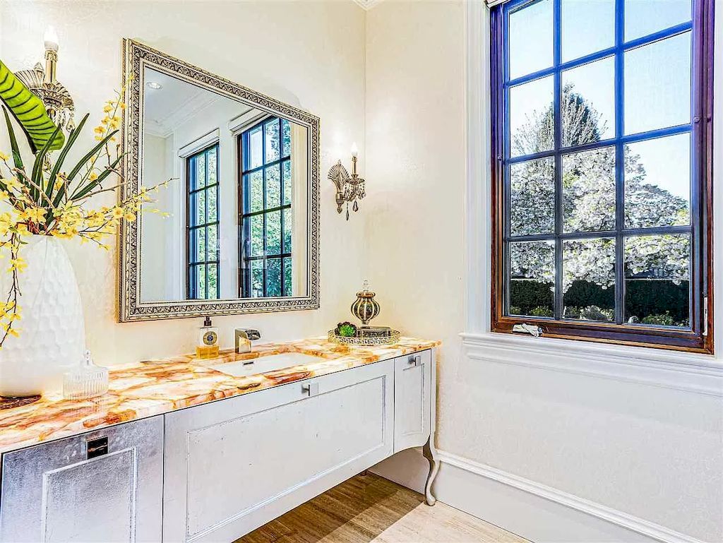The Beautiful Cherry Blossoms House in Vancouver is a meticulously custom-built home now available for sale. This home is located at 1626 Avondale Ave, Vancouver, BC V6M 1S1, Canada